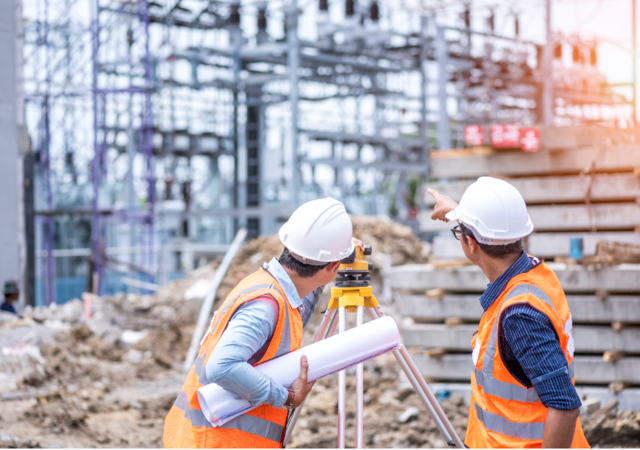 Two engineers in construction site