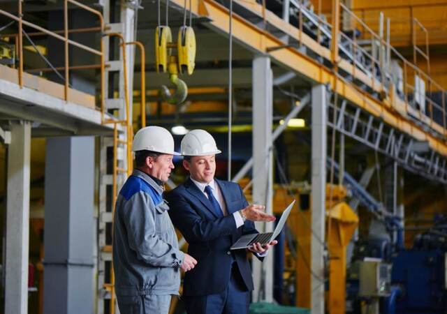 Two engineers in construction site