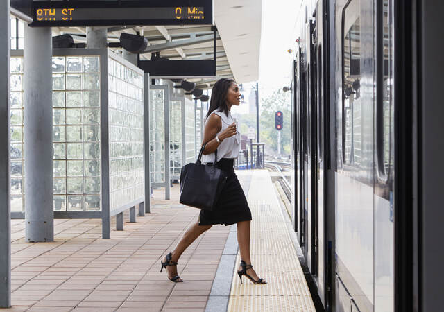 A traveler uses public transport