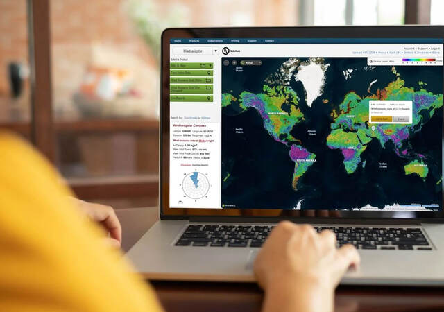 A person using Windnavigator software on a laptop