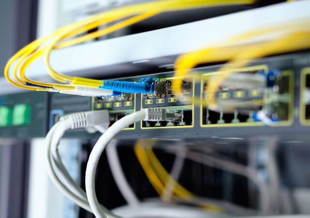 Yellow cables in the back of equipment