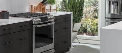 Kitchen with black smart appliances 