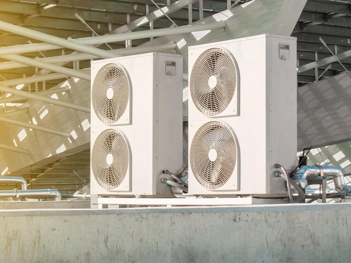 Air conditioning compressor installation outside building