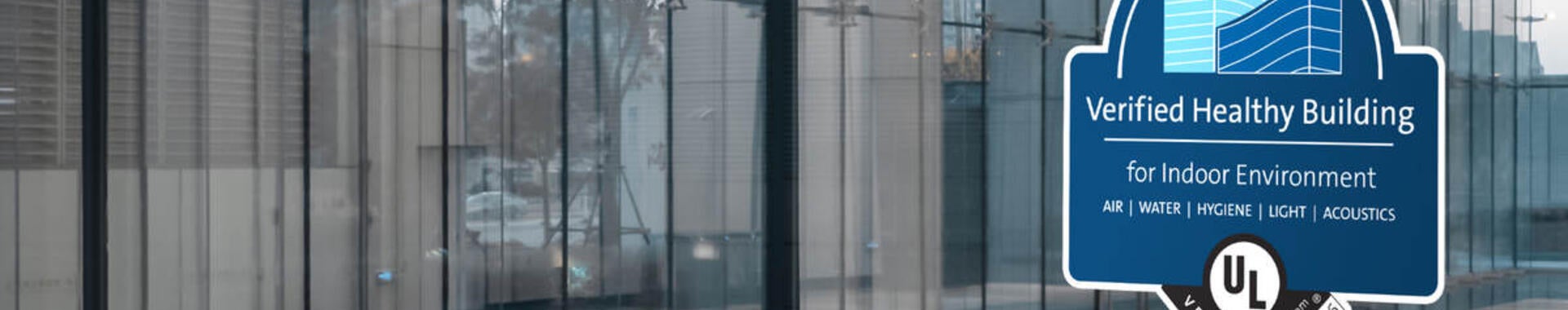 Verified health building mark on glass door of a building