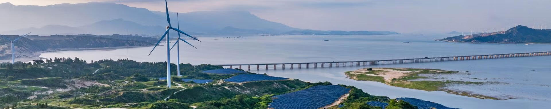 Wind turbines looking over a lake
