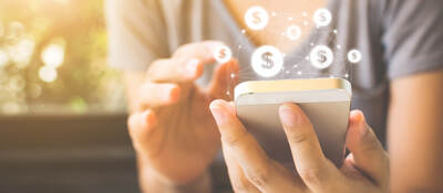 A person using a cell phone for online shopping