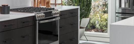 Kitchen with black smart appliances 