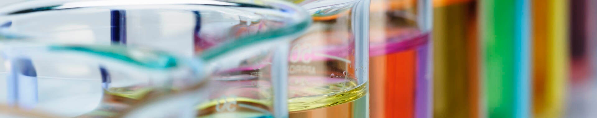 Lab Beakers of colored solutions.